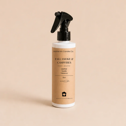 Fall Smoke and Campfires room spray from Home Inn Candle with a beige background