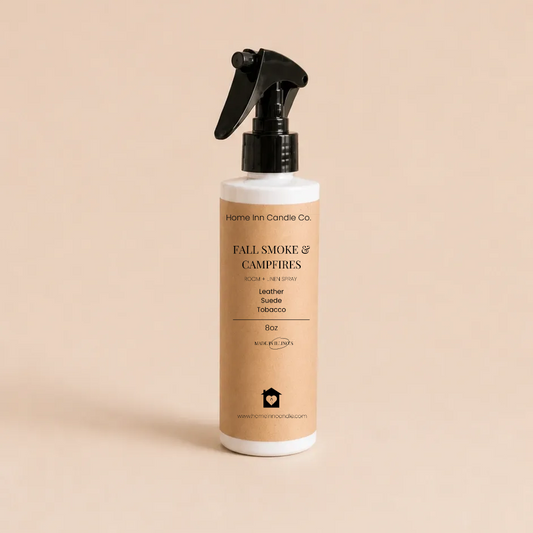 Fall Smoke and Campfires room spray from Home Inn Candle with a beige background