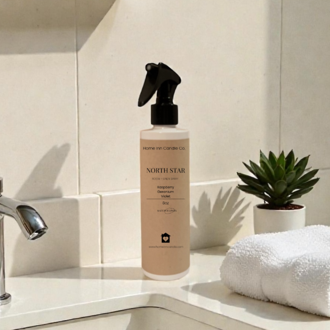 Home Inn Candle North Star Room Spray in bathroom with sink and towel with home decor