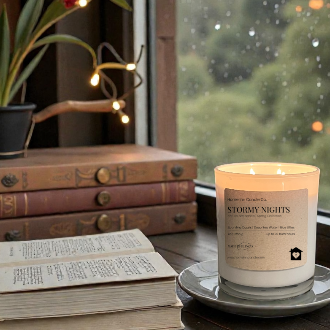 Stormy Nights Candle from Home Inn Candle with rain in window and books on window seal